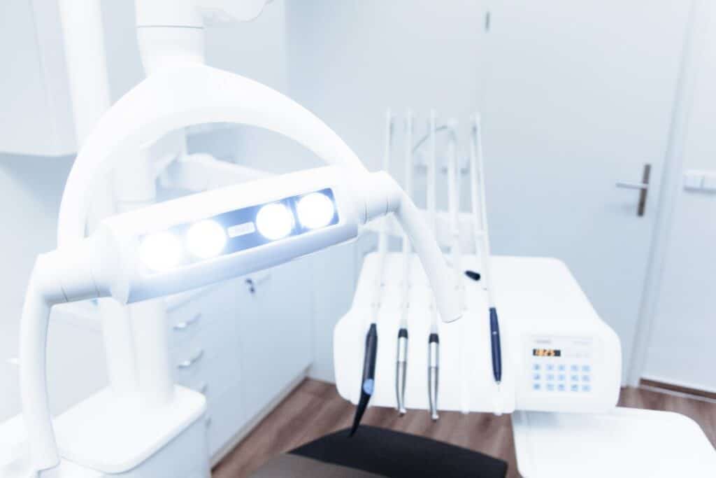 Modern dental CT scanner in bright clinical setting with advanced imaging equipment