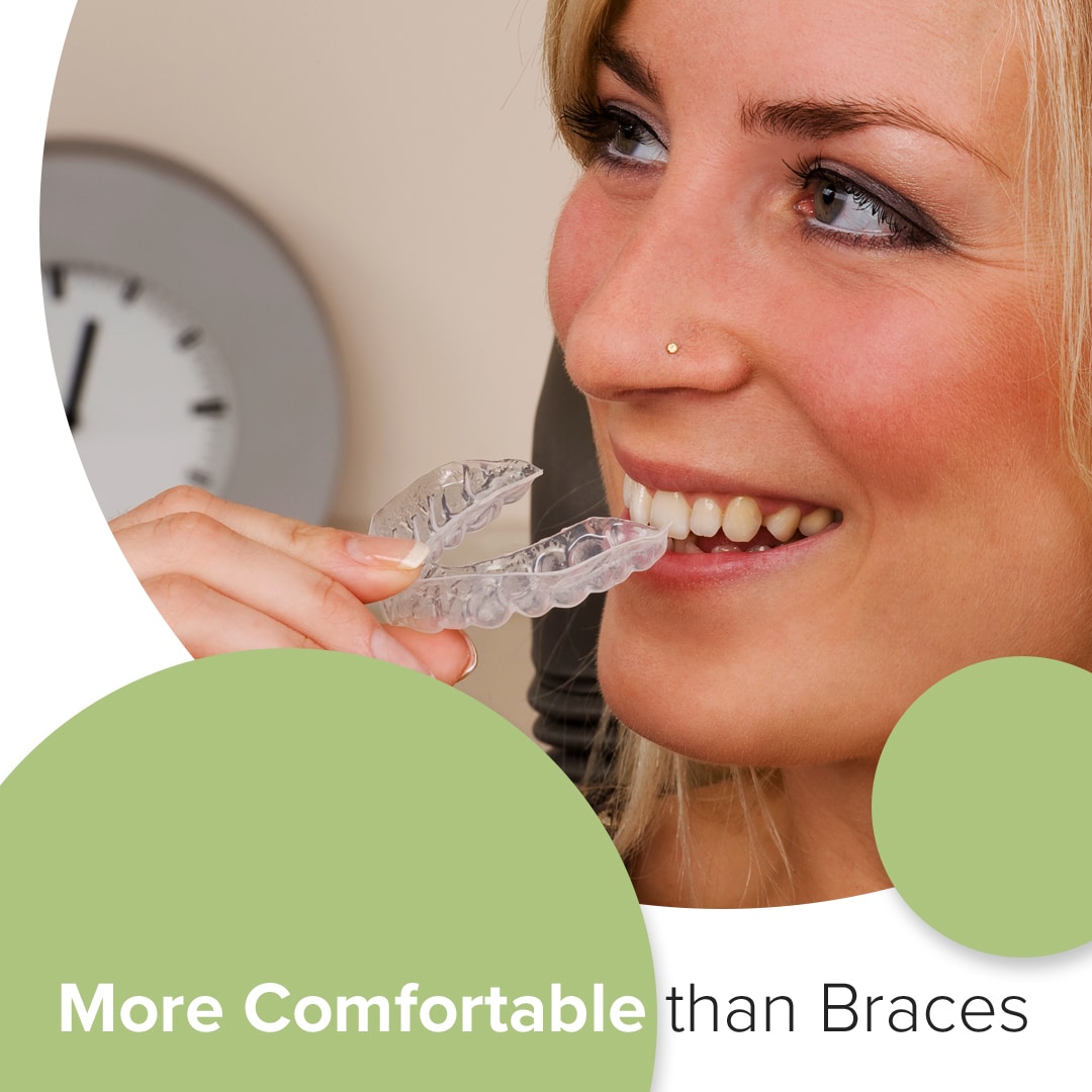 Woman inserting clear aligners with clock in background, text "More Comfortable than Braces"