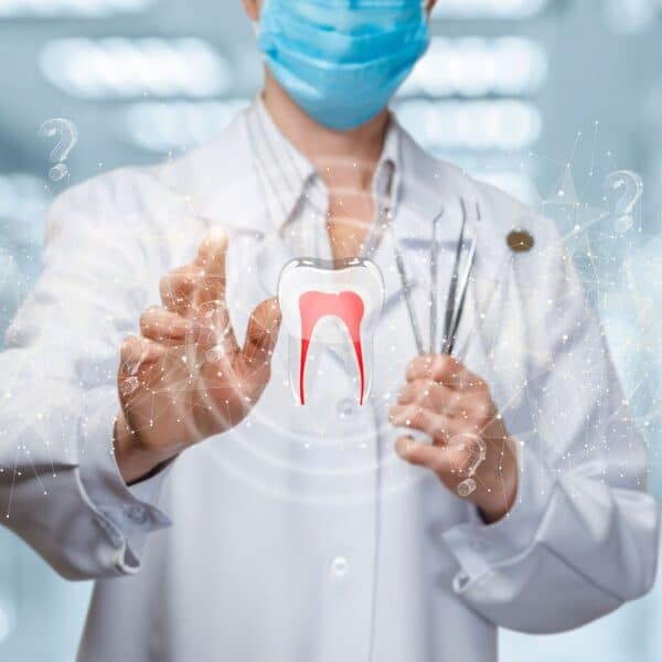 Dentist reaching out towards a tooth icon