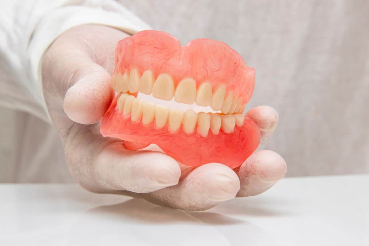 Replacing Dental Implants With Dentures: Is It Possible?